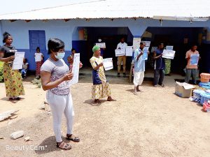 The educational posters have instructions written in several Sierra Leone dialects as well as being depicted in images.