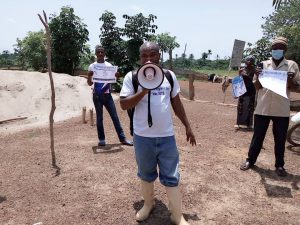 COVID-19 educational session with community leaders on sanitation and hygiene.