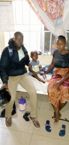 Musa with mother and MOH staff in hospital